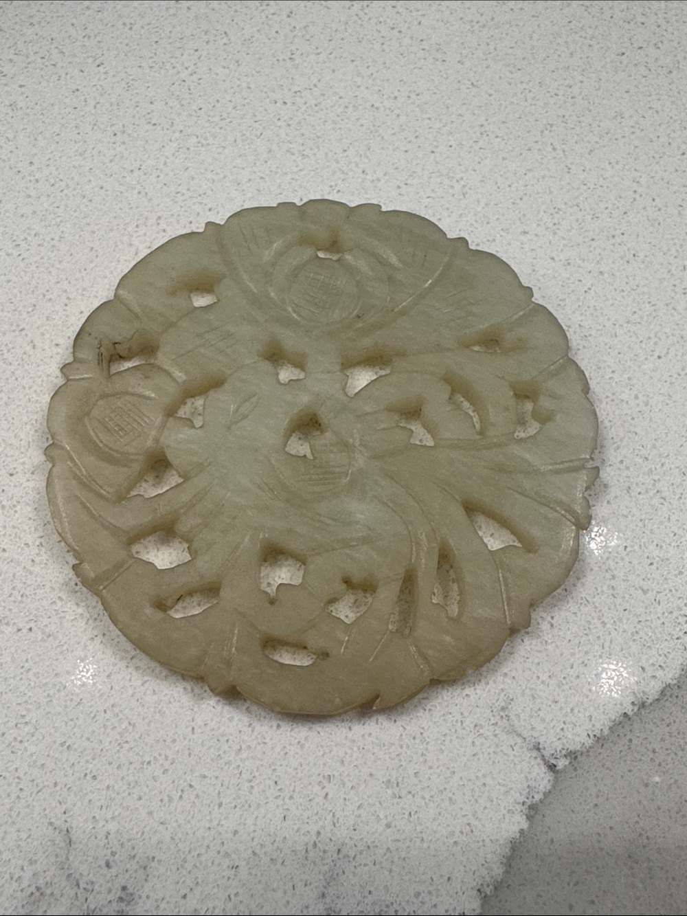 Carved Round Jade Pendant - Pale cream colored  Floral Motif